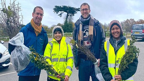 Peter and Cllr Stotesbury giving trees to residents